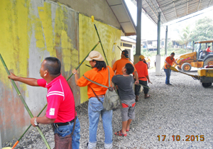 Volunteers lend a hand to St. Damien Church
