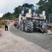 Cement stabilised pavement being laid at KM8.3 of the Miri-Marudi Road