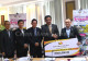 Handing over the cheque to YB Datuk Abdul Karim Rahman Hamzah, Minister for Tourism, Arts, Culture, Youth and Sports