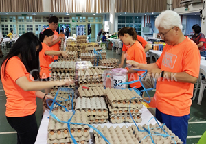 Caring CMS employees at the Sarawak Society for the Deaf Charity Food Fair